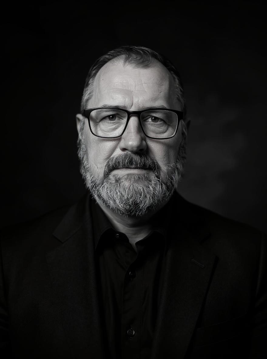 Create a high-end black and white portrait using my selfie. The face must remain exactly as in on my original selfie no editing, no retouching, no smoothing. I'm wearing the business suits.
Preserve every facial detail and texture for a raw, authentic look. The lighting should be dramatic and studio-quality, using strong contrast and shadows to sculpt the features.
Use a clean, blurred studio-style background with soft gradients or subtle texture to enhance focus on the subject.
Frame the portrait vertically (9:16 format), centered composition, with ultra-realistic skin texture and depth. No digital makeup or alterations. The final result should look timeless, editorial, and emotionally powerful - suitable for a gallery or fashion magazine.