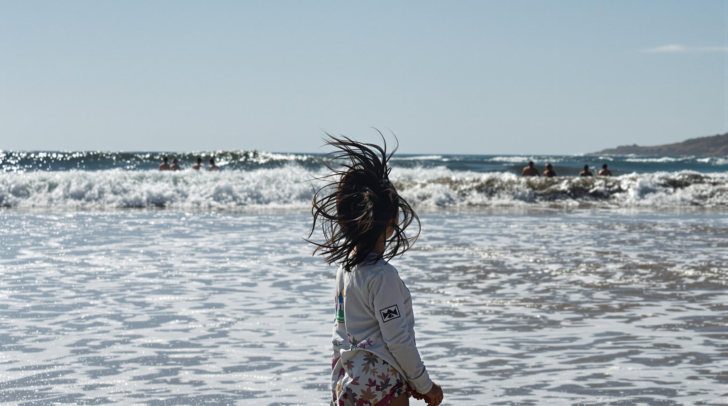 girl-stand-on-the-beach-windy-s8mb4ob6gu