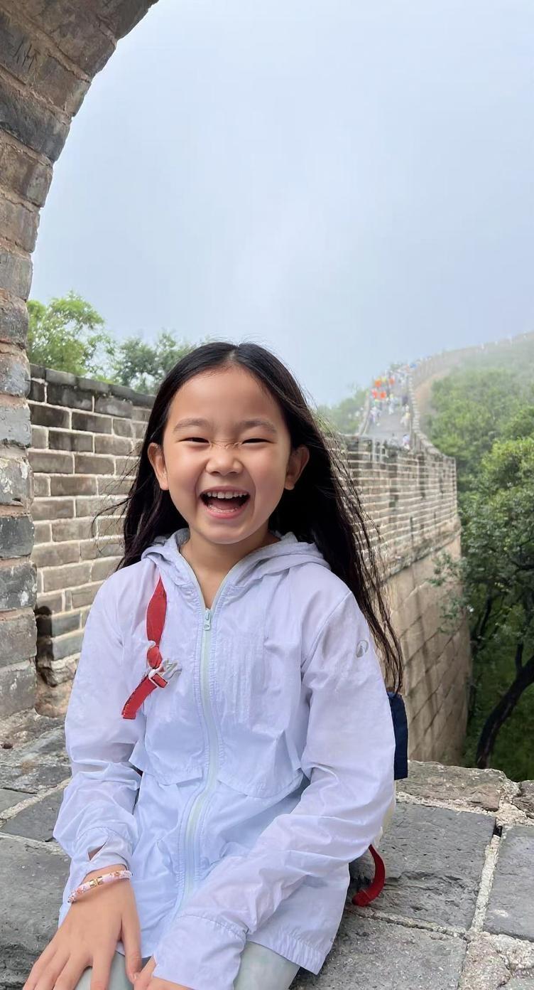 a-10-year-old-chinese-girl-laugh-loud-1-x0l3xtv0q0