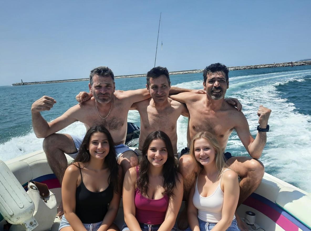 3 athletic men with 3 young beautiful women below them. they are on a boat. keep original faces 