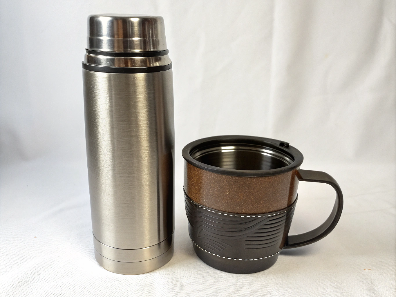 thermos-next-to-a-mug-png-72jvtjbst2