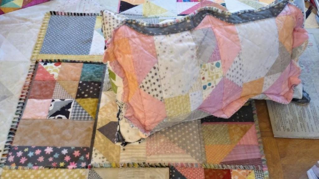 The quilt is smaller and the pillow is smaller