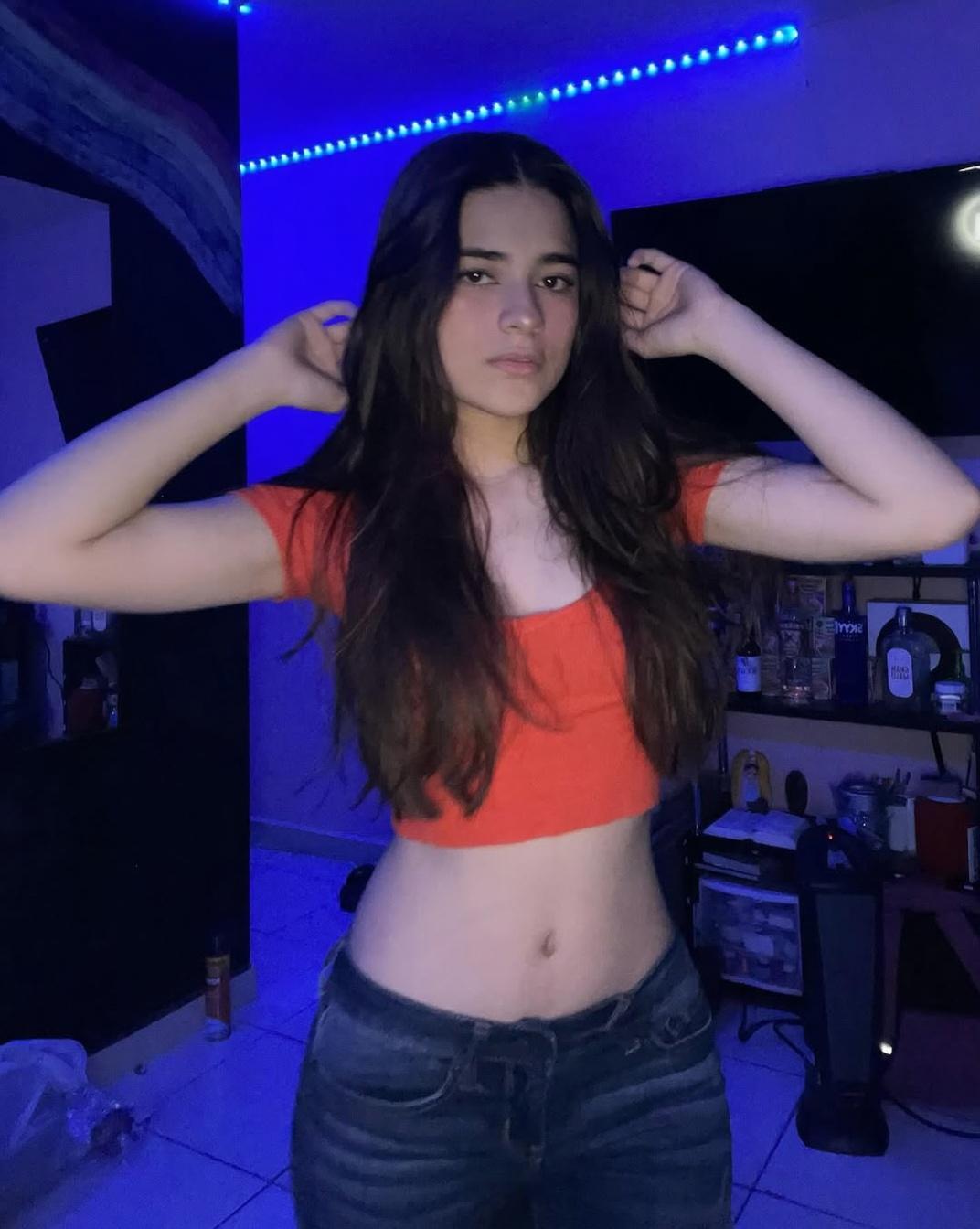 Change her clothes to underwear. Keep the same persona, the same lighting, just change the outfit.