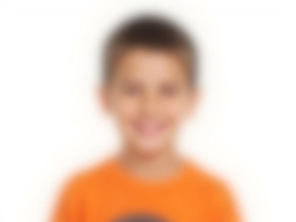 the-image-shows-a-young-boy-in-an-orange-shirt-a120naswfn
