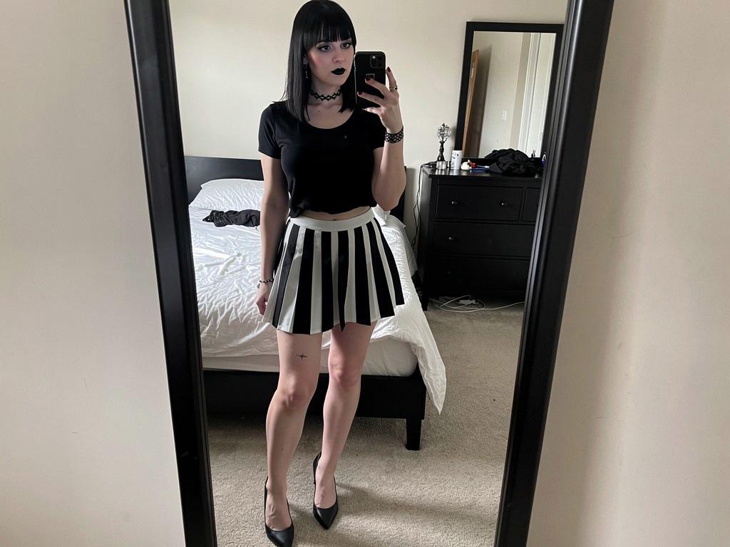 make-a-pciture-of-a-goth-girl-taking-a-mirror-kd2jp4oicx